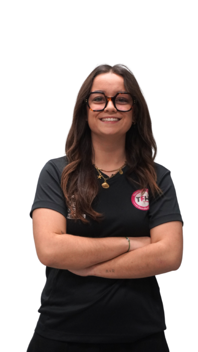 Femme portant des lunettes, sourire, TFHB, Toulouse féminin handball.